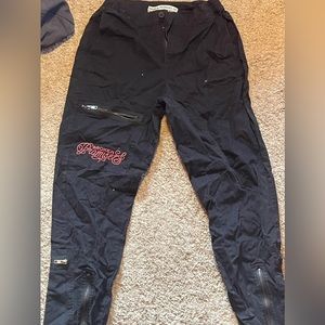 BROKEN PROMISES BLACK ZIP JEANS